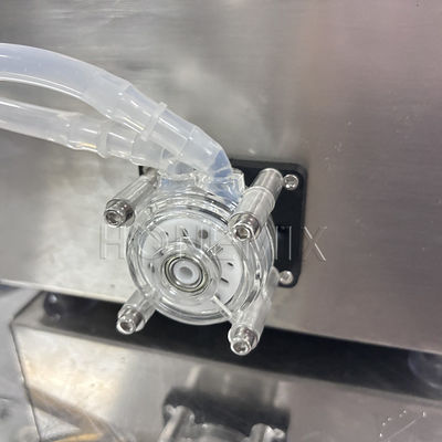 Máquina de llenado de botellas de aceite líquido Semi-automático de llenado de bomba peristáltica