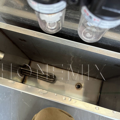 Máquina de llenado de bálsamo con calefacción cosmética Máquina de llenado vertical semiautomática
