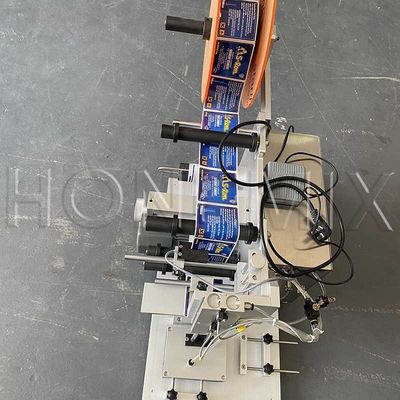Máquina de etiquetado de etiquetas semiautomática de 100W para botellas planas