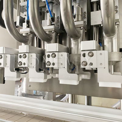 Máquina de llenado de crema de cuatro cabezas de seguimiento de servo pistón