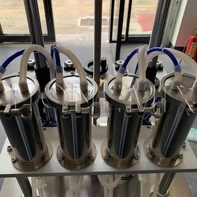 Equipo de fabricación de perfumes líquidos Cuatro cabezas Máquina automática de llenado de perfumes