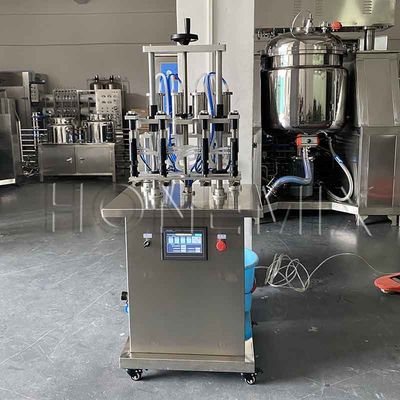 Equipo de fabricación de perfumes líquidos Cuatro cabezas Máquina automática de llenado de perfumes