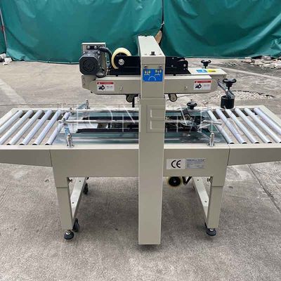Máquina de embalaje automática de 220V / 50HZ 12mm caja de cartón sellador adhesivo de cinta adhesiva