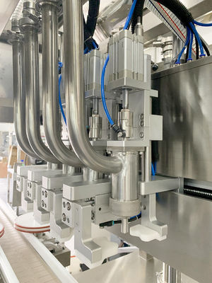 Máquina de llenado de crema de seguimiento de servo pistón de tapa de la máquina